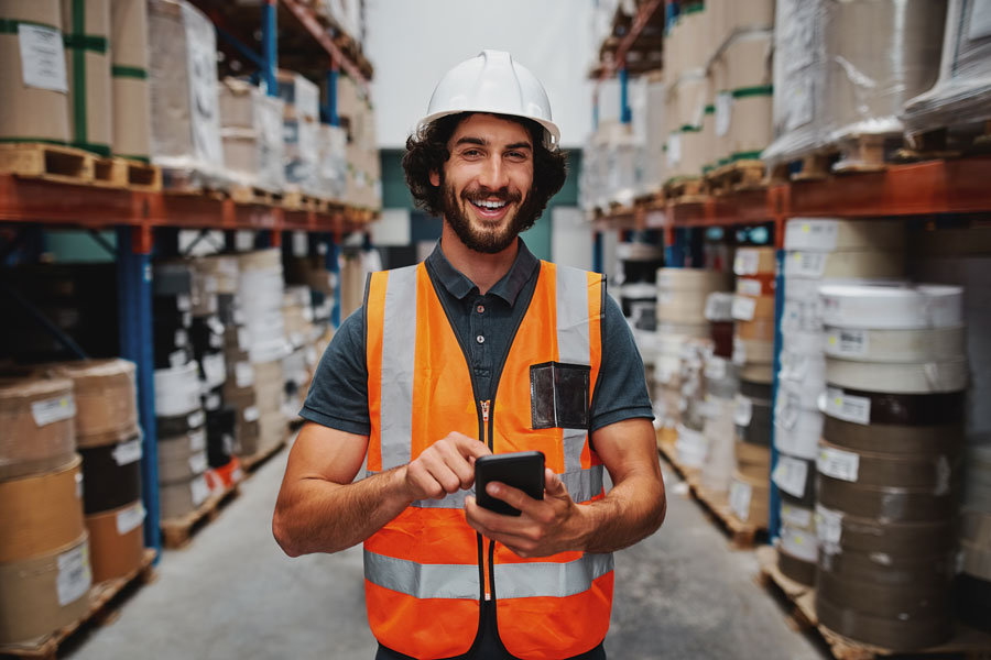 AdobeStock_336991277_ warehouse worker on phone